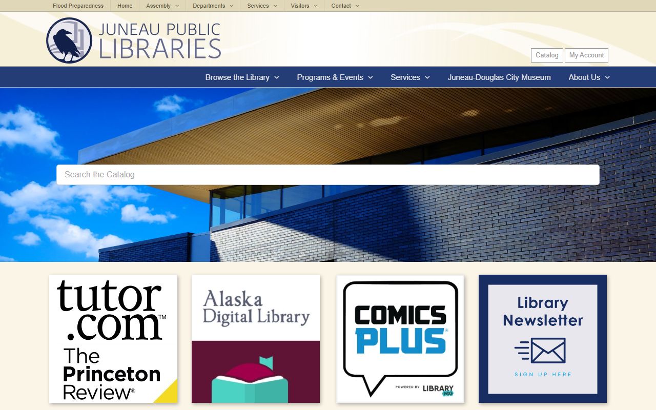 Juneau Public Library building in Juneau Alaska showing the library entrance and research resources