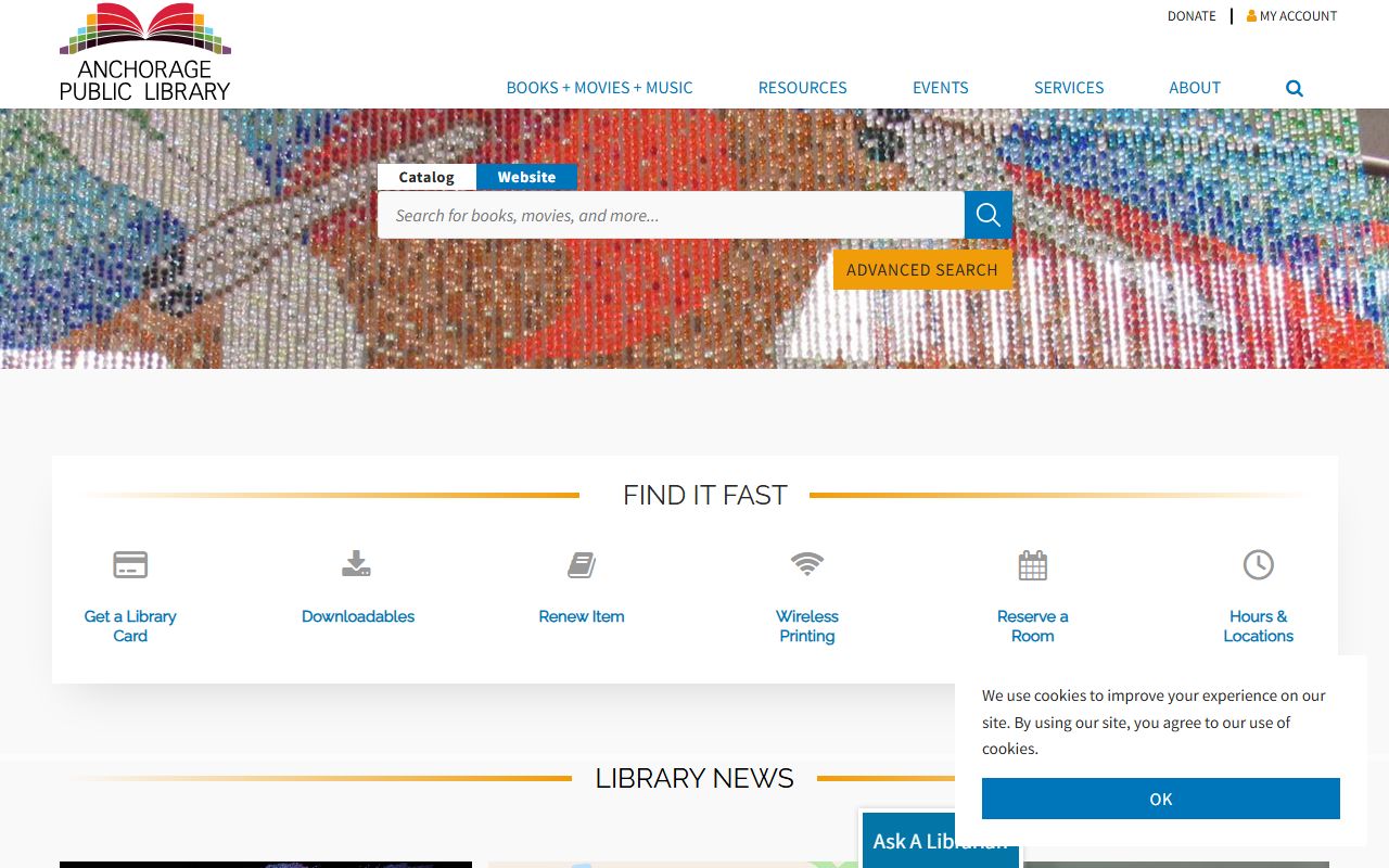 Anchorage Public Library on Denali Street showing the library entrance and signage